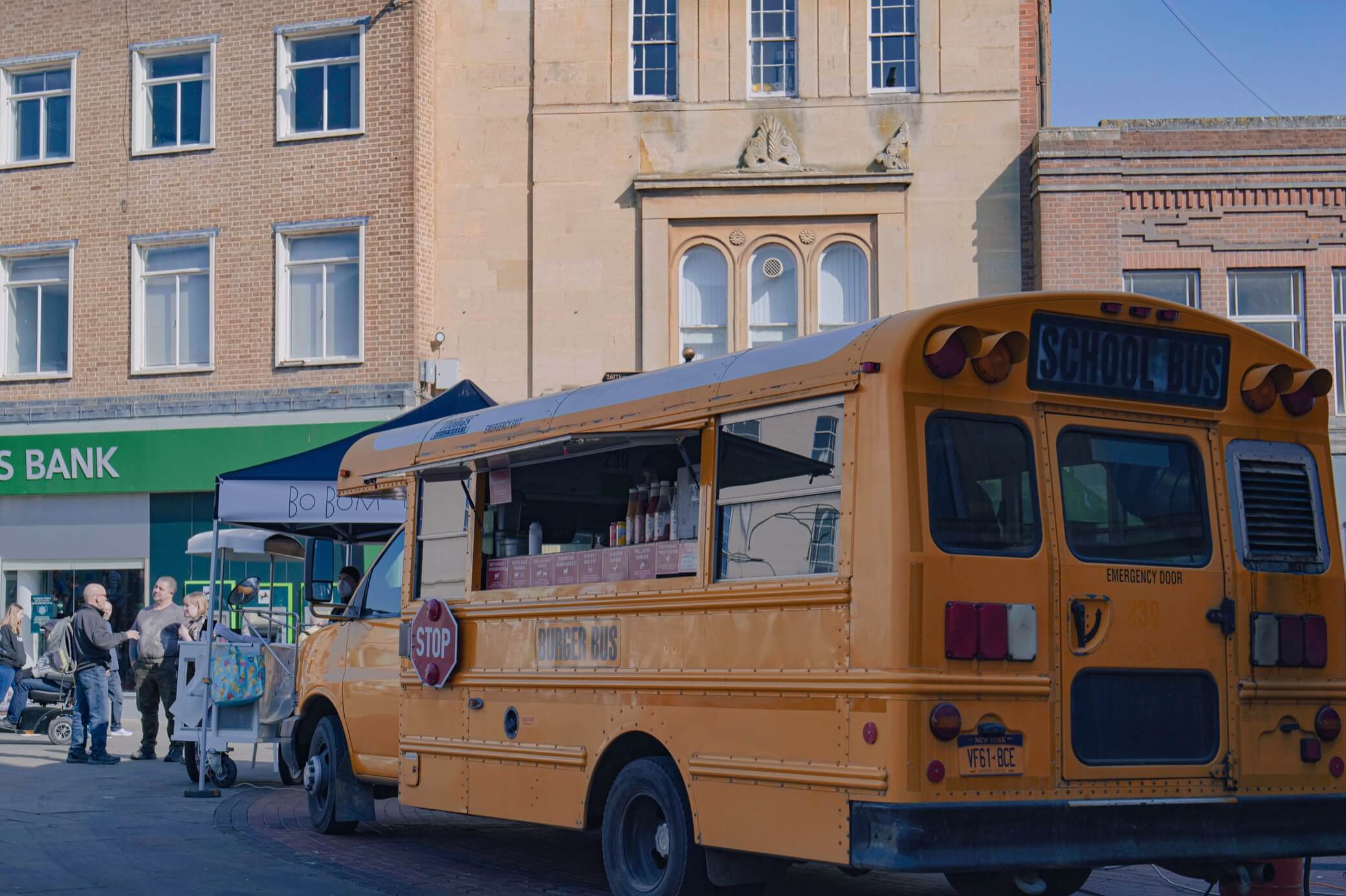 Food truck serving customers outdoors